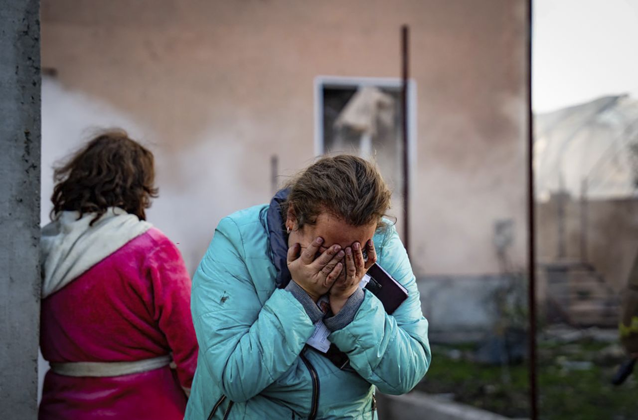 A woman cries after her home was destroyed in a Russian missile attack in the Odesa region, Ukraine, on November 17.