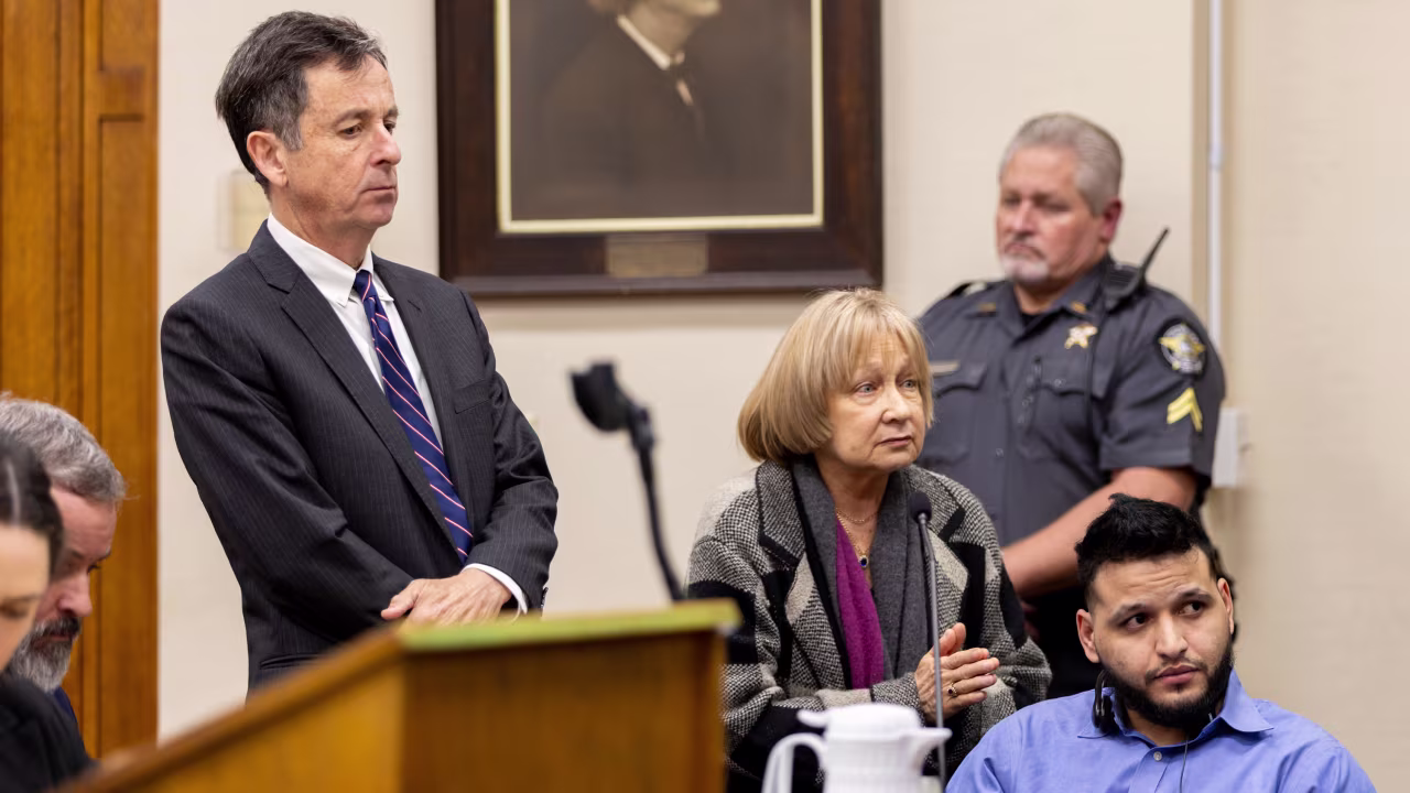 Defendant Jose Ibarra, right, listens to Judge H. Patrick Haggard during his trial.