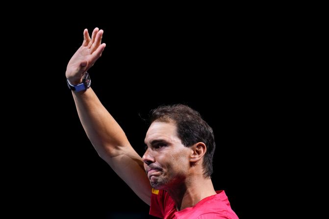 Nadal waves to the crowd during a tribute after <a href="https://www.cnn.com/2024/11/19/sport/rafael-nadal-botic-van-de-zandschulp-spt-intl/index.html">playing his last match as a professional tennis player</a> in the Davis Cup quarterfinals in Málaga, Spain, in November 2024.