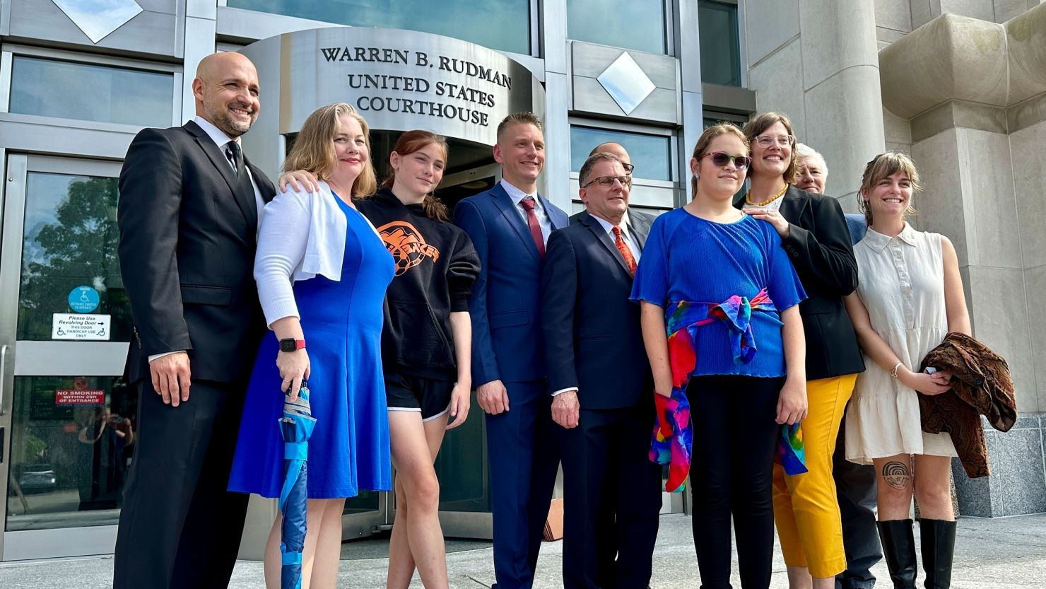 Parker Tirrell, third from left, and Iris Turmelle, sixth from left, have filed suit challenging President Donald Trump's executive order banning trans girls from girls' sports.