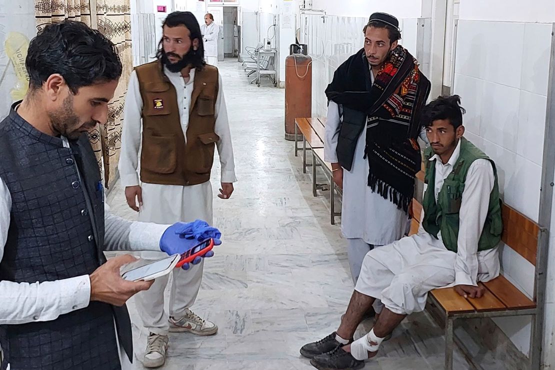 An injured victim, right, is treated at a hospital in Parachinar, in Kurram district of Pakistan's northwestern Khyber Pakhtunkhwa province on Thursday.