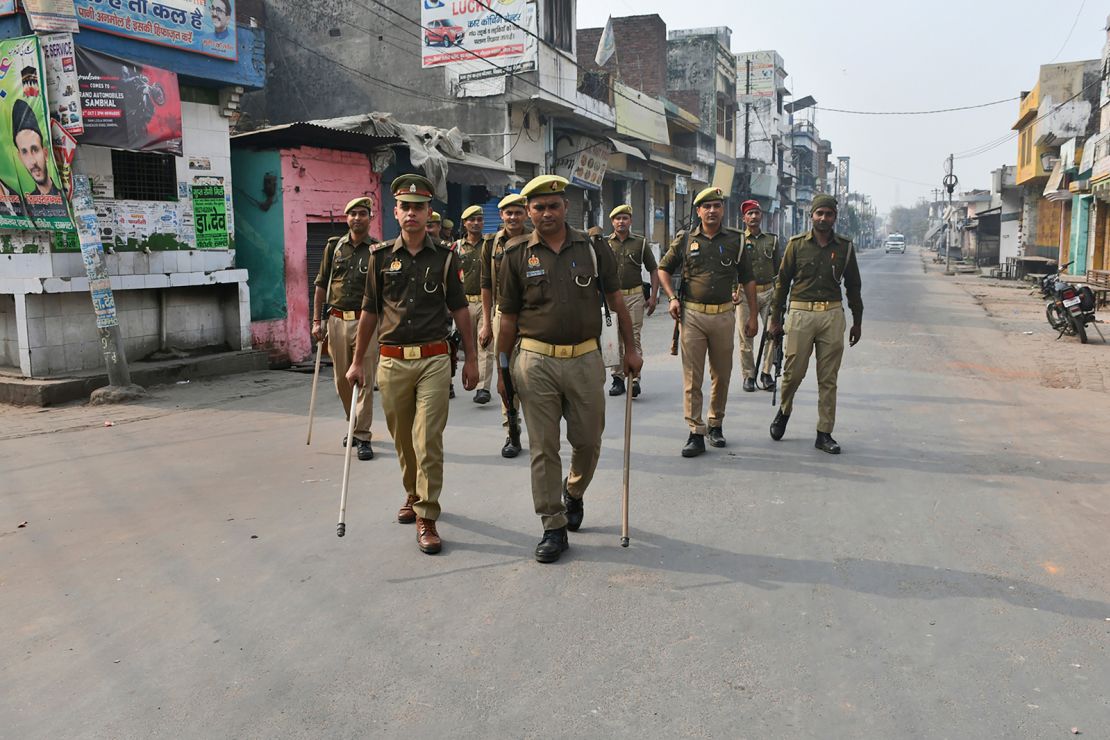 Policemen patrol on the deserted streets of Sambhal, in the northern Indian state of Uttar Pradesh, on November 25, 2024.