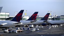 Delta Airlines planes stand at their JFK terminal 4 two days before the official start of Thanksgiving holiday, New York, NY, November 26, 2024. More than 80 million travelers are expected to take the roads, trains and sky, with 6 million expected to fly. (Photo by Anthony Behar/Sipa USA)(Sipa via AP Images)