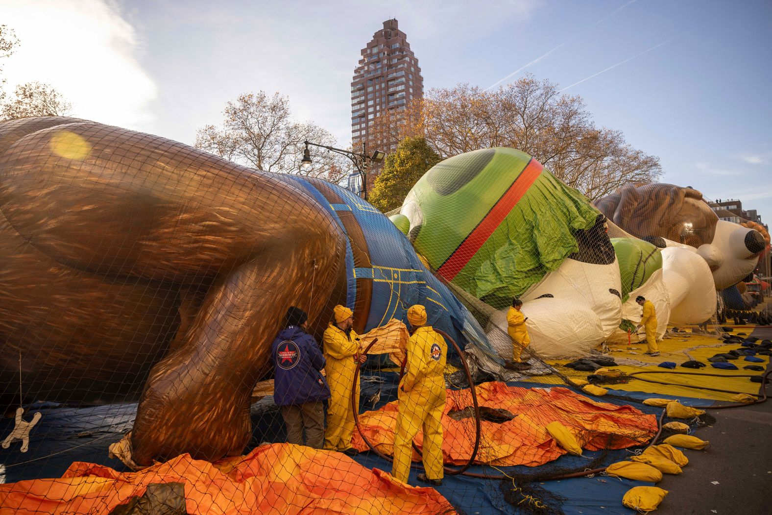 People inflate Macy's Thanksgiving Day Parade balloons on Wednesday in New York.