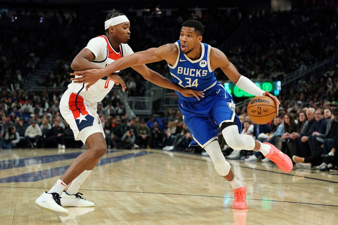 Antetokounmpo shoots to the basket against Bilal Coulibaly of the Wizards.