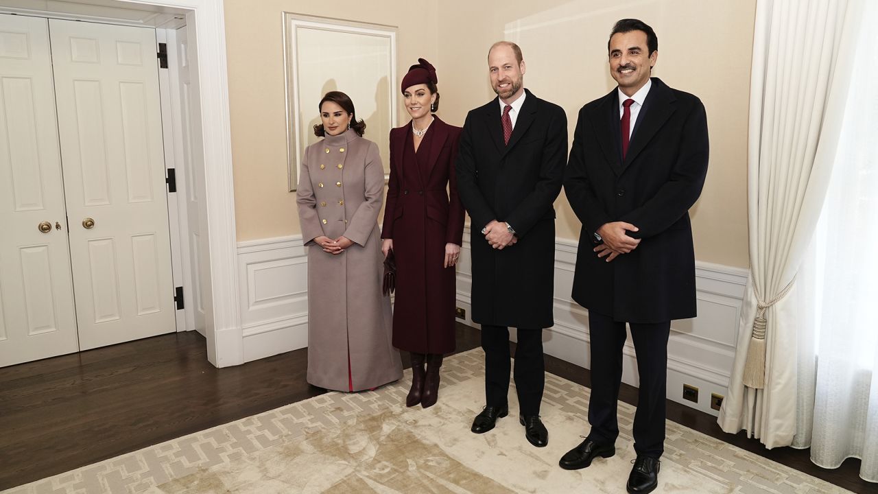 Britain's Prince William, center right, and Kate, Princess of Wales, center left, pose with the Emir of Qatar Sheikh Tamim bin Hamad Al Thani, right, and his wife Sheikha Jawaher, left, as they meet in London.