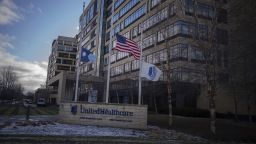 Flags fly at half mast in front of UnitedHealthcare headquarters in Minnetonka, Minn., Wednesday Dec. 4, 2024, after its CEO Brian Thompson was shot and killed in New York City.