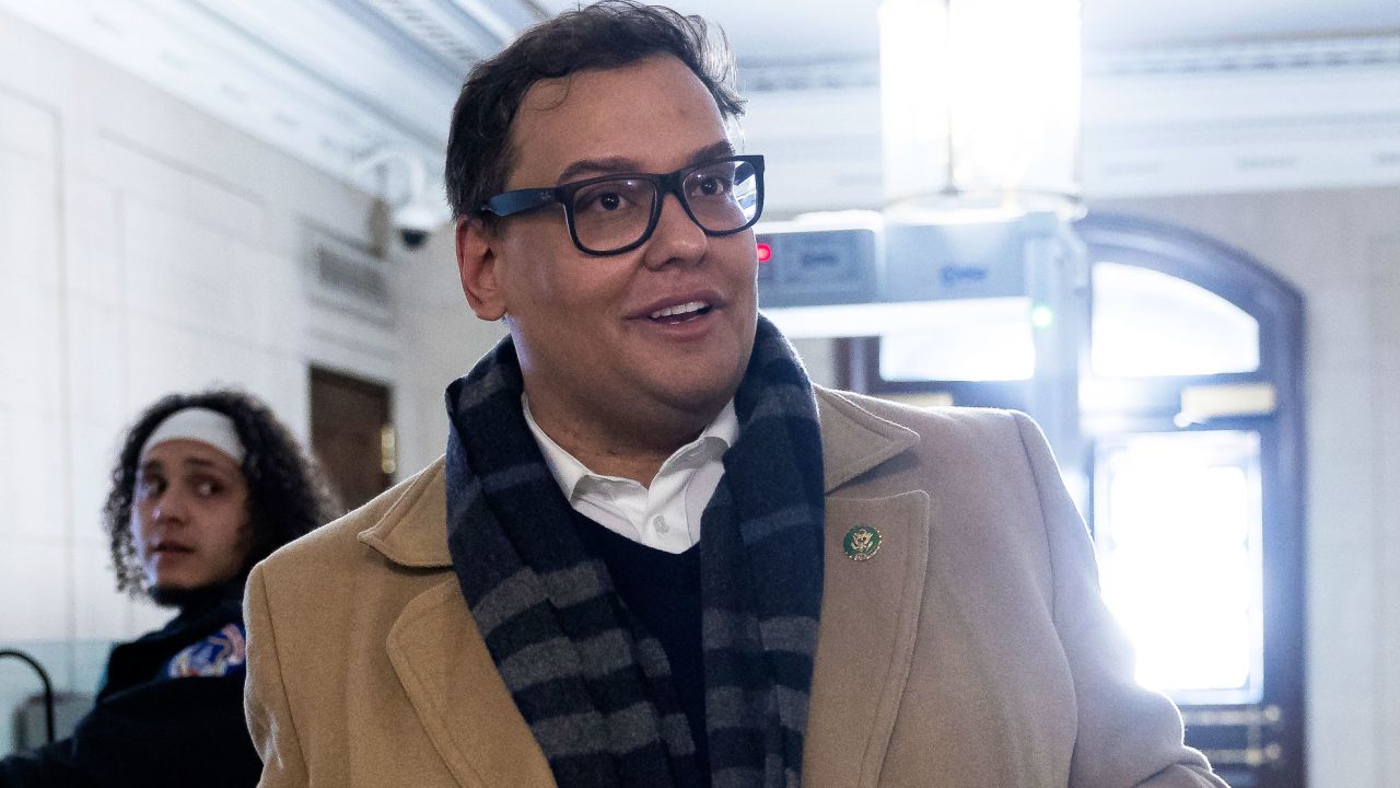 Former New York Republican congressman George Santos stops to speak with reporters as he departs the Longworth House Office Building on Capitol Hill Dec. 5, 2024. (Francis Chung/POLITICO via AP Images)