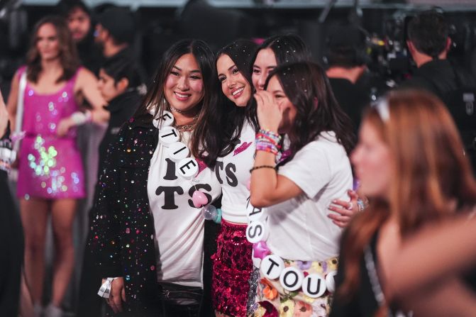 Concertgoers pose for a photo during a Swift concert in Vancouver in December 2024.