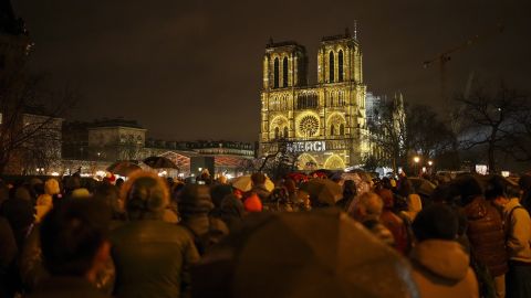 Spectators gather outside France's iconic Notre Dame Cathedral Saturday, Dec. 7, 2024 in Paris for it's formal reopening for the first time since a devastating fire nearly destroyed the 861-year-old landmark in 2019.