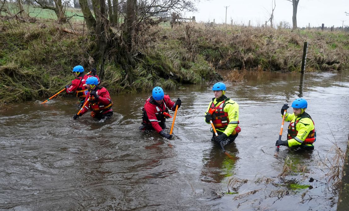 Members of a search and rescue team during a search operation for former England rugby player Tom Voyce.