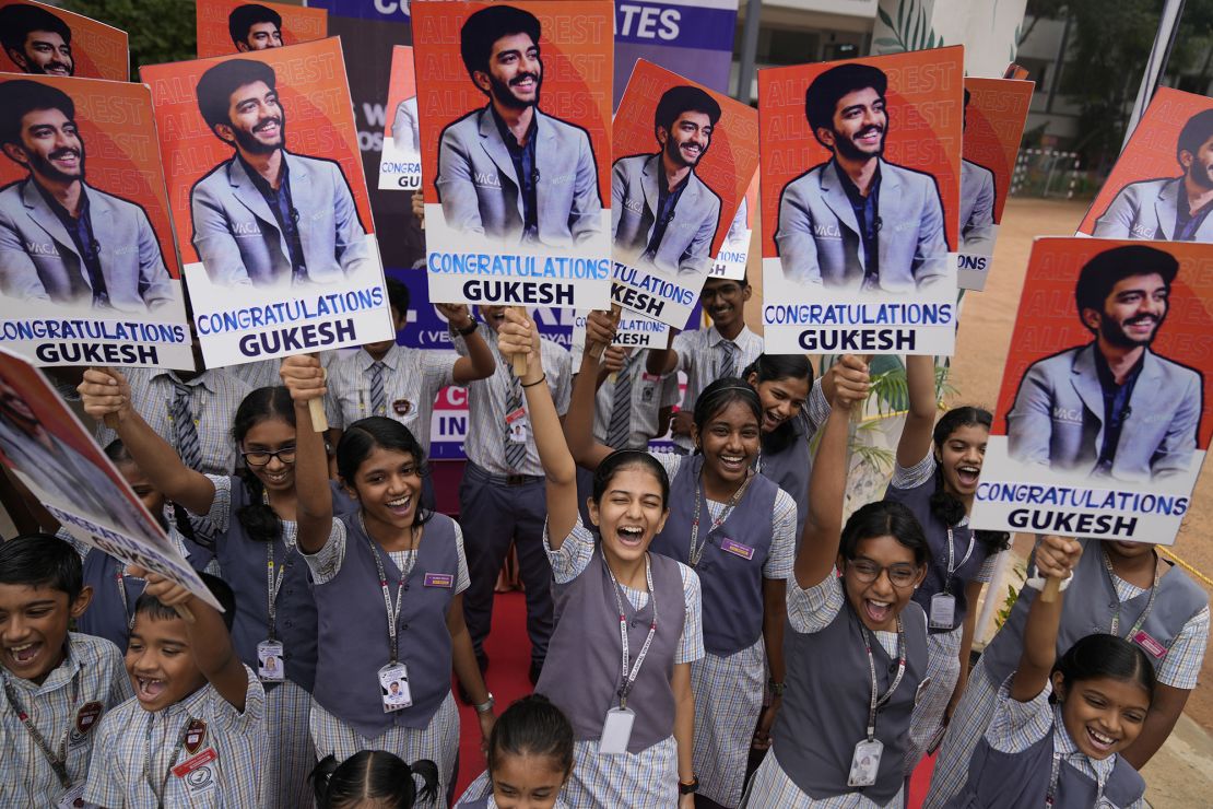 Students at Gukesh Dommaraju's school in Chennai celebrate after Gukesh became the youngest ever world chess champion.