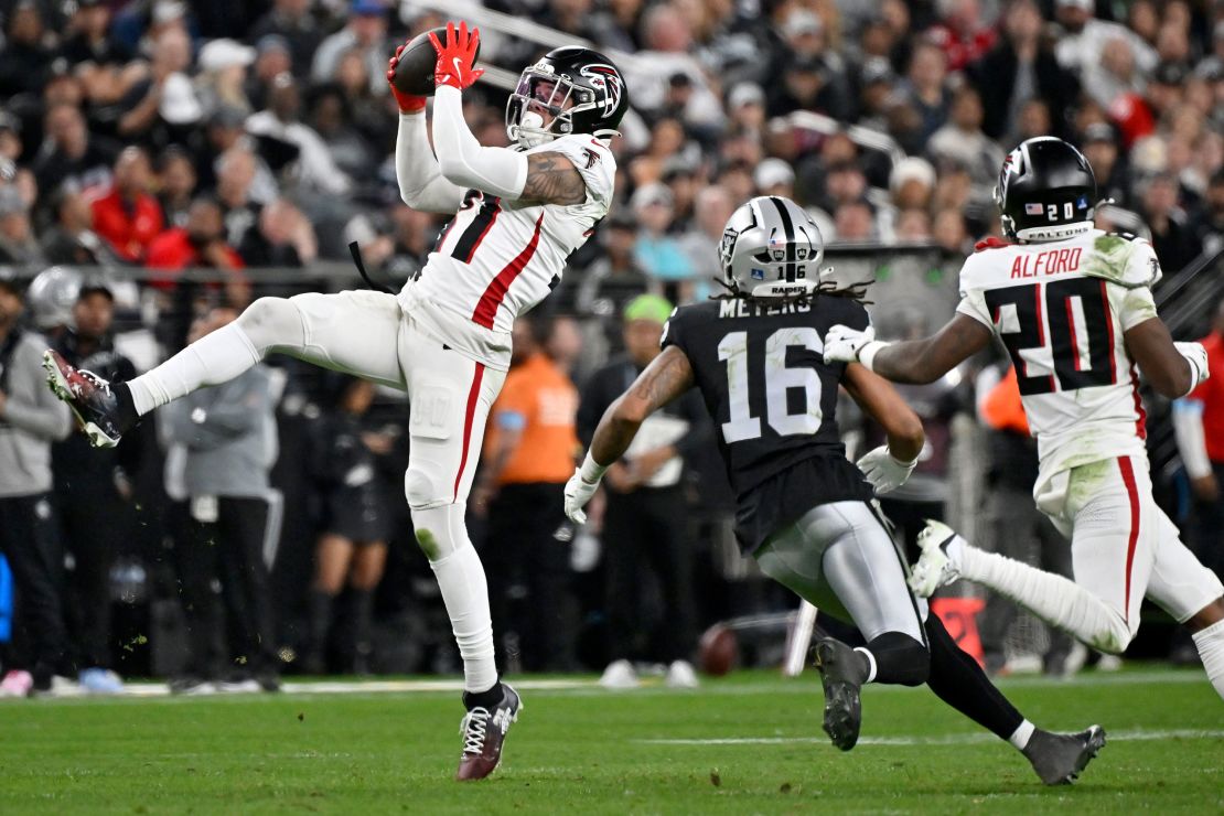 Atlanta Falcons safety Justin Simmons intercepts a pass during the second half against the Las Vegas Raiders.