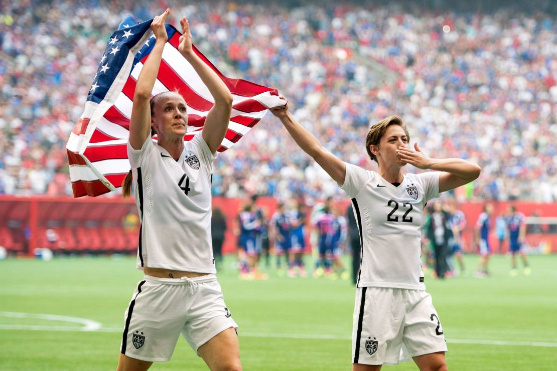 Becky Sauerbrunn and Meghan Klingenberg celebrate following the USWNT's win over Japan at the Women's World Cup in Vancouver on July 5, 2015.