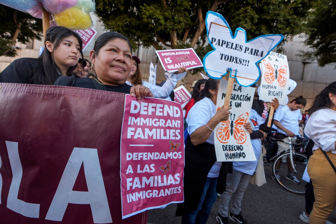 Members of the Coalition for Humane Immigrant Rights join migrant workers and others in a march on the "International Day of Action and Solidarity with Migrants" in downtown Los Angeles on December 18.