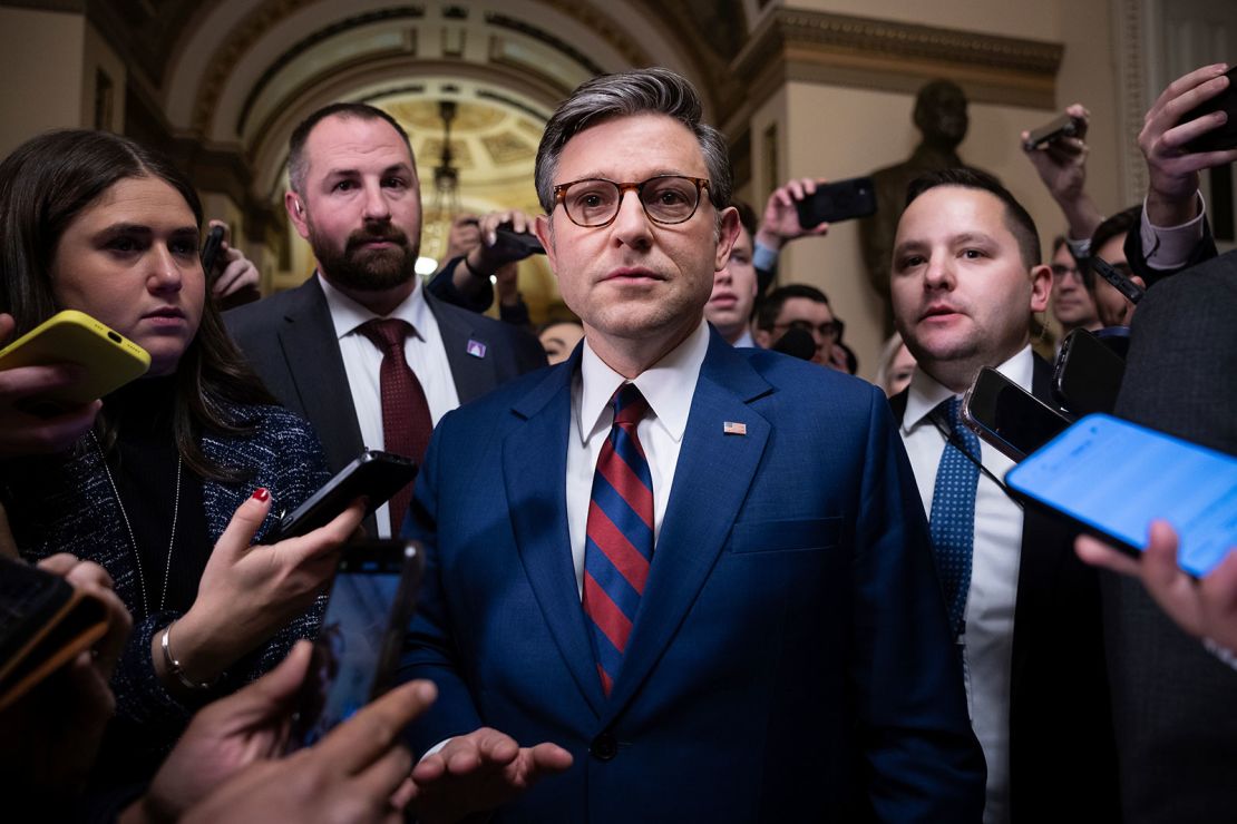 House Speaker Mike Johnson speaks to reporters as he emerges from the House of Representatives after a stopgap government spending bill supported by President Trump failed to pass in a House vote Thursday, Dec. 19, 2024.