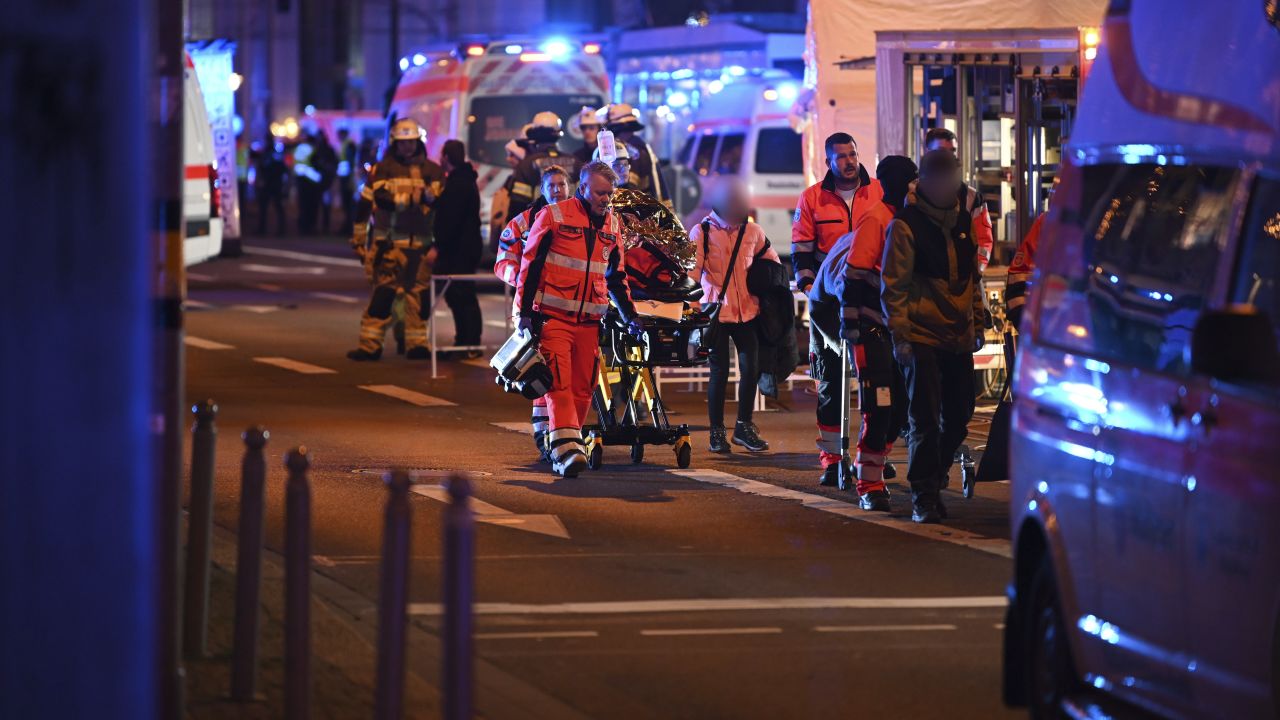 Emergency personnel arrive to help the injured at the Christmas market in Magdeburg, Germany on Friday, December 20.