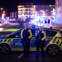 Police officers guard a cordoned-off area near the scene where a car drove into a crowd at a Christmas market in Magdeburg, Germany, Friday, December 20.