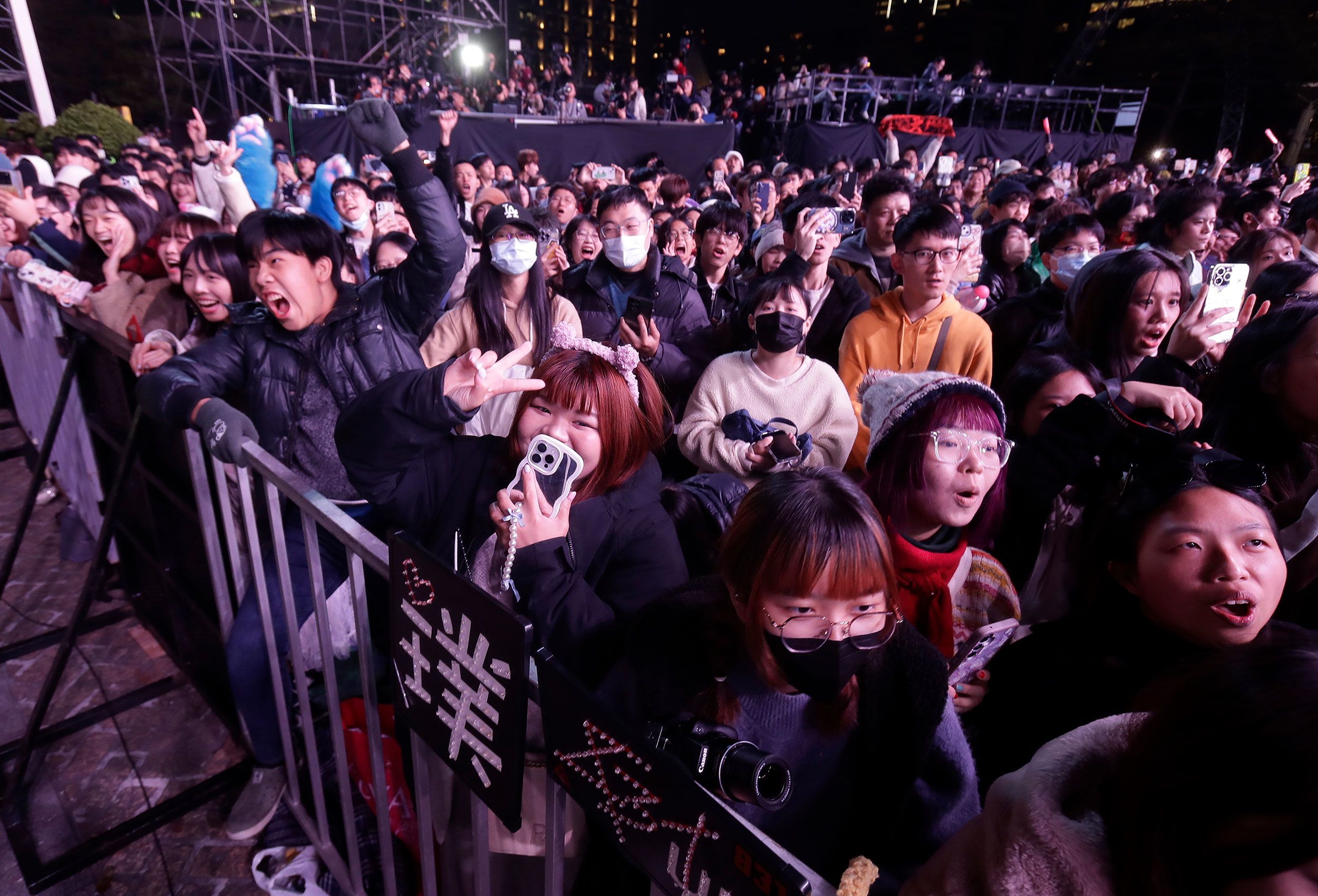 People cheer during a New Year's celebration in Taipei.