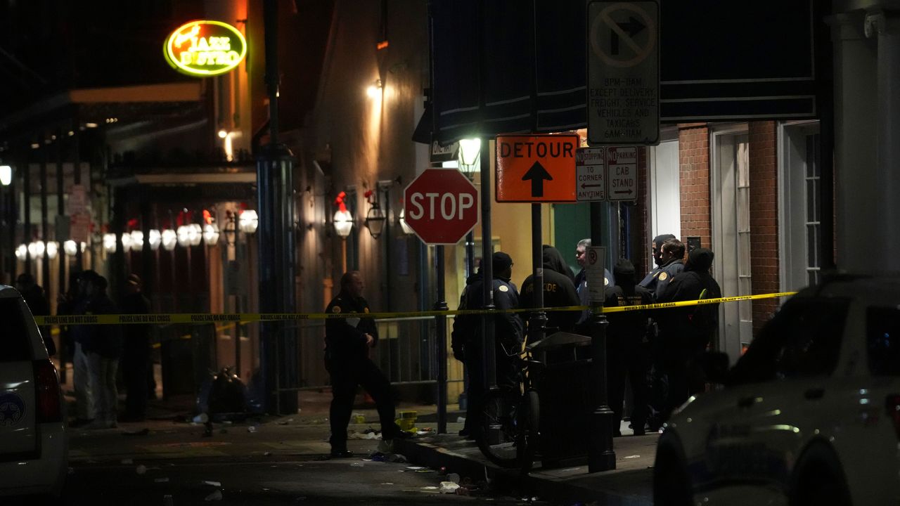 Emergency services attend the scene after a vehicle drove into a crowd on New Orleans' Canal and Bourbon Street, Wednesday Jan. 1, 2025. (AP Photo/Gerald Herbert)