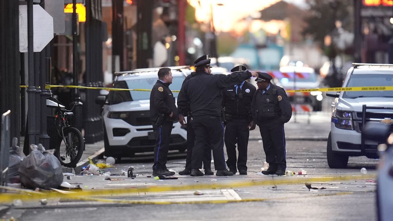 Emergency services attend the scene on Bourbon Street after a vehicle drove into a crowd on New Orleans' Canal and Bourbon Street, Wednesday Jan. 1, 2025. (AP Photo/Gerald Herbert)