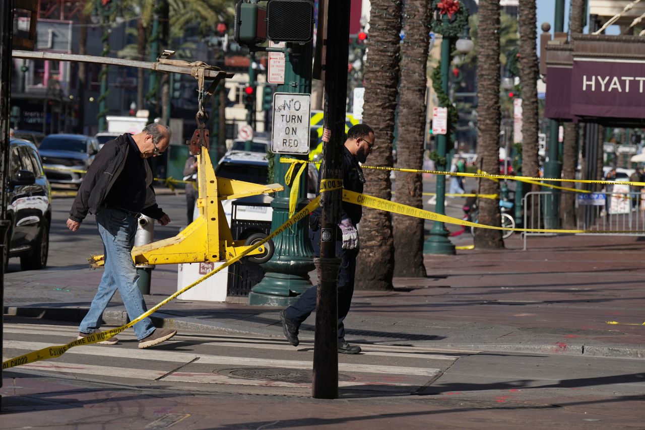 Barriers are set up on at Canal and Bourbon streets on Thursday in New Orleans.