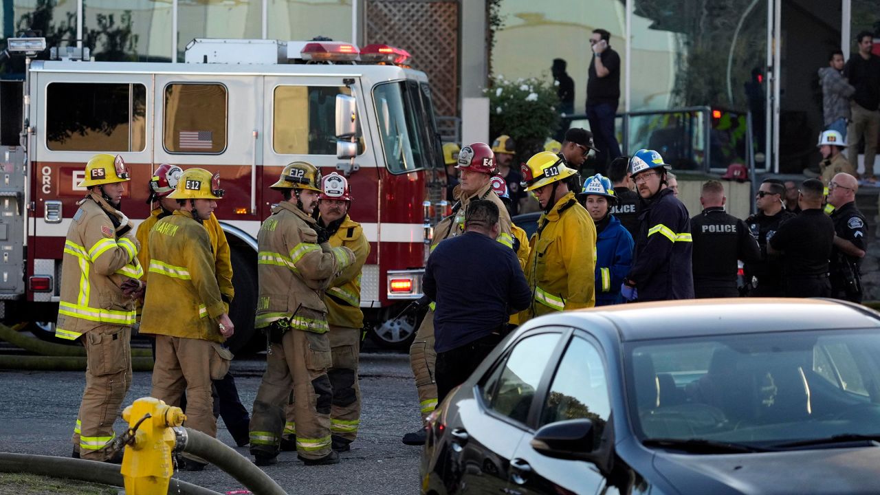 Firefighters respond to a commercial building where a small plane crashed Fullerton, California, on January 2, 2025.