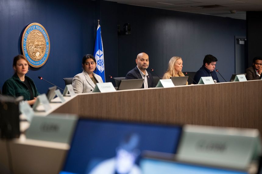 Council President Elliott Payne, center, and the Minneapolis City Council vote to review a federal consent decree mandating reforms to the city police department.