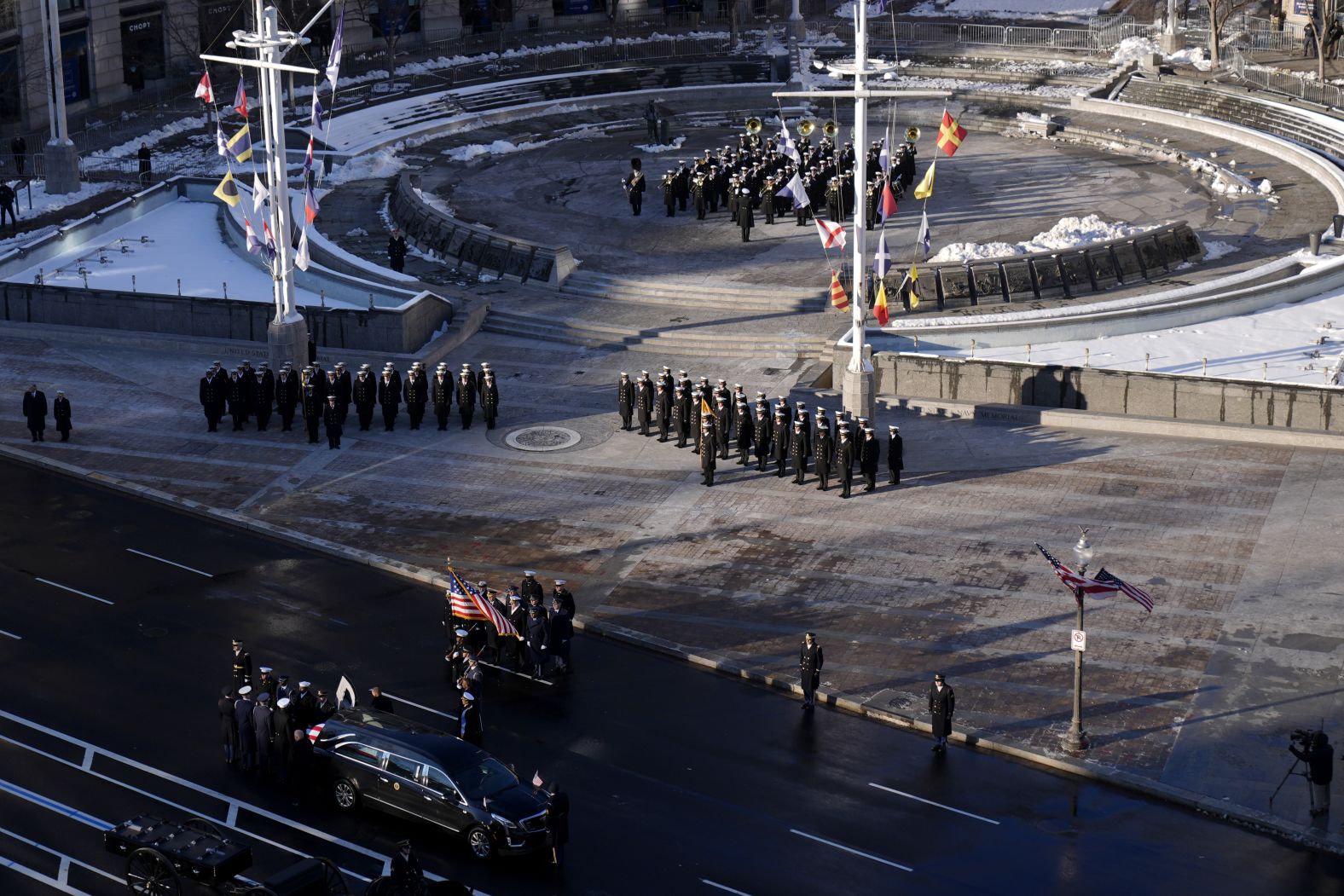 Carter's casket is transferred to the horse-drawn caisson at the US Navy Memorial before traveling on to the Capitol.