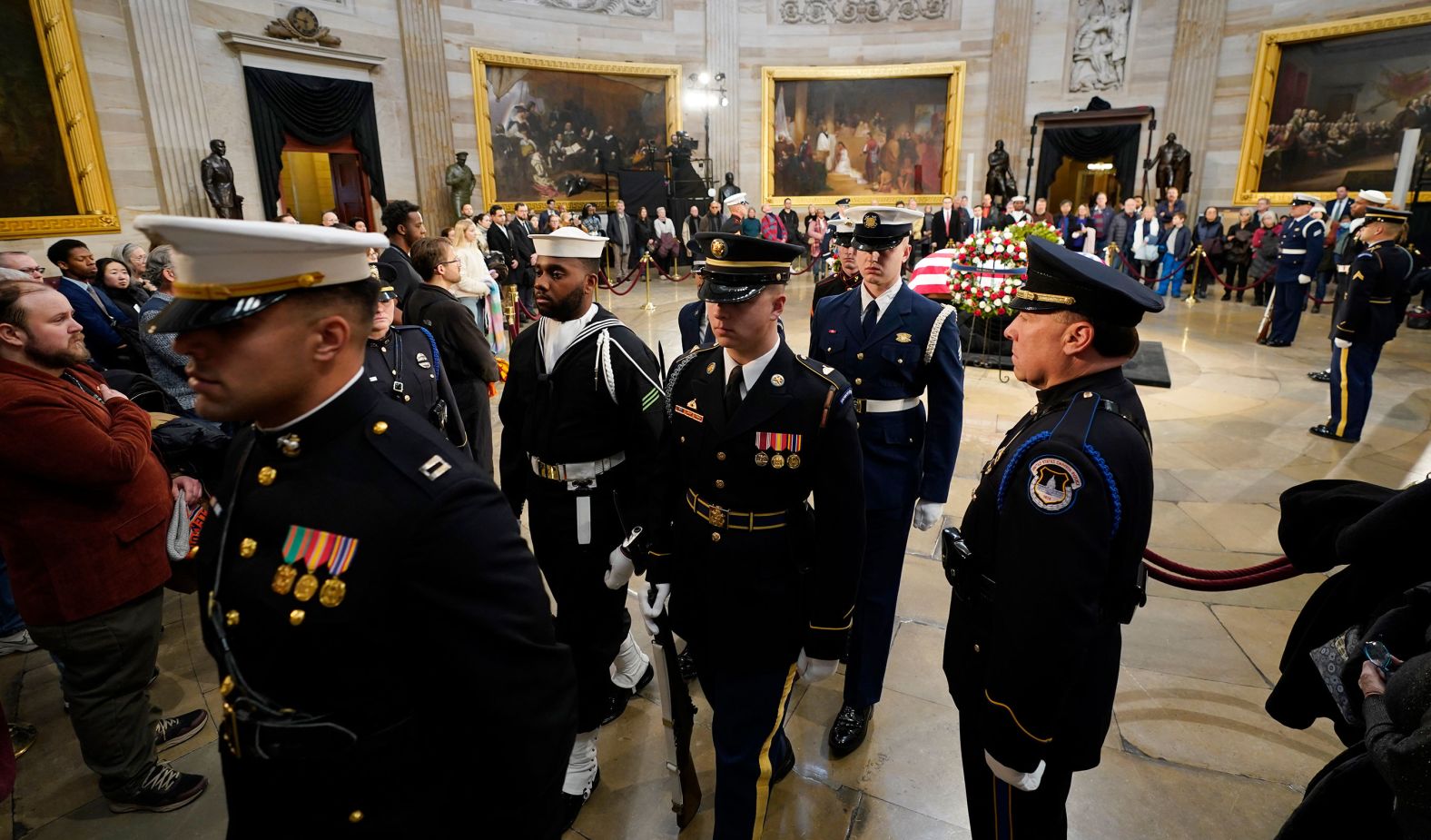 A military honor guard departs the Capitol Rotunda on January 8.