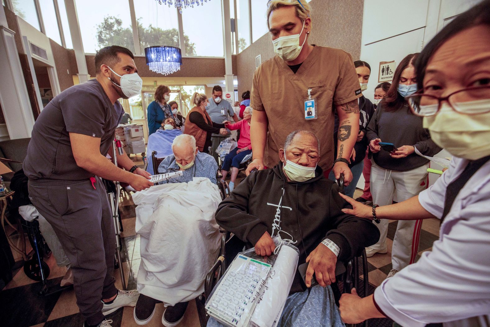 Residents are evacuated from a senior living facility in Altadena as the Eaton Fire approaches.