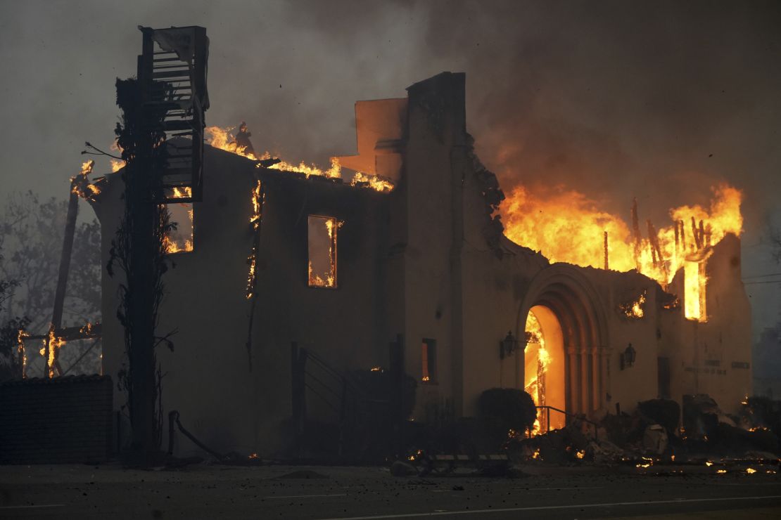The Altadena Community Church burns during the Eaton Fire on January 8.