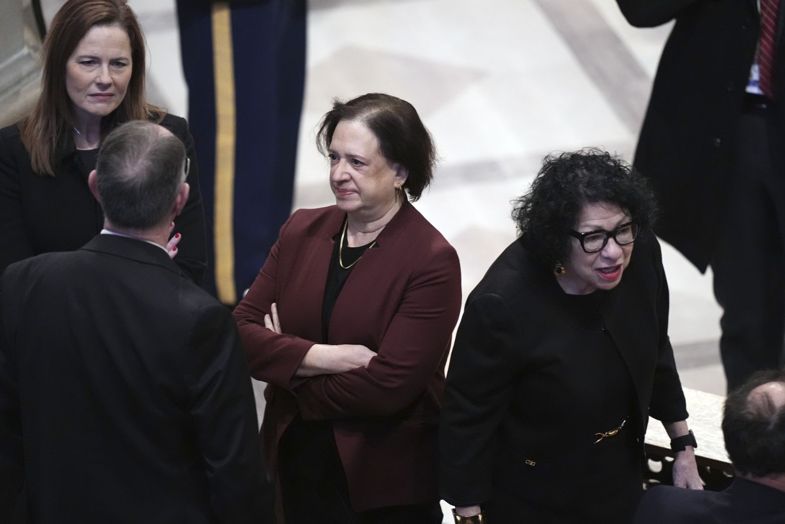 From left, Supreme Court Justices Amy Coney Barrett, Elena Kagan and Sonia Sotomayor arrive at the funeral.