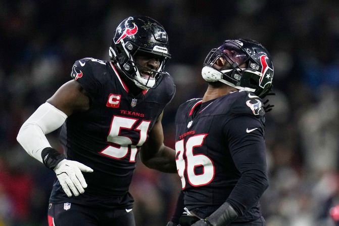 Houston Texans defensive end Denico Autry celebrates with Will Anderson Jr. after sacking Los Angeles Chargers quarterback Justin Herbert during the second half of a wild-card playoff game Saturday, January 11, in Houston. <a href="index.php?page=&url=https%3A%2F%2Fwww.cnn.com%2Fsport%2Flive-news%2Fnfl-wild-card-01-11-25%23cm5swh82y00003b6mpcd4b0p6">The Texans won 32-12</a> and advance to the divisional round.