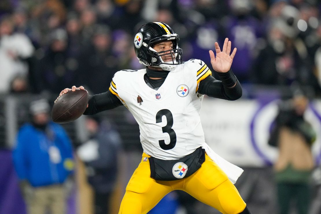 Pittsburgh Steelers quarterback Russell Wilson throws a pass against the Baltimore Ravens during the second half of an NFL Wild Card Playoff football game.