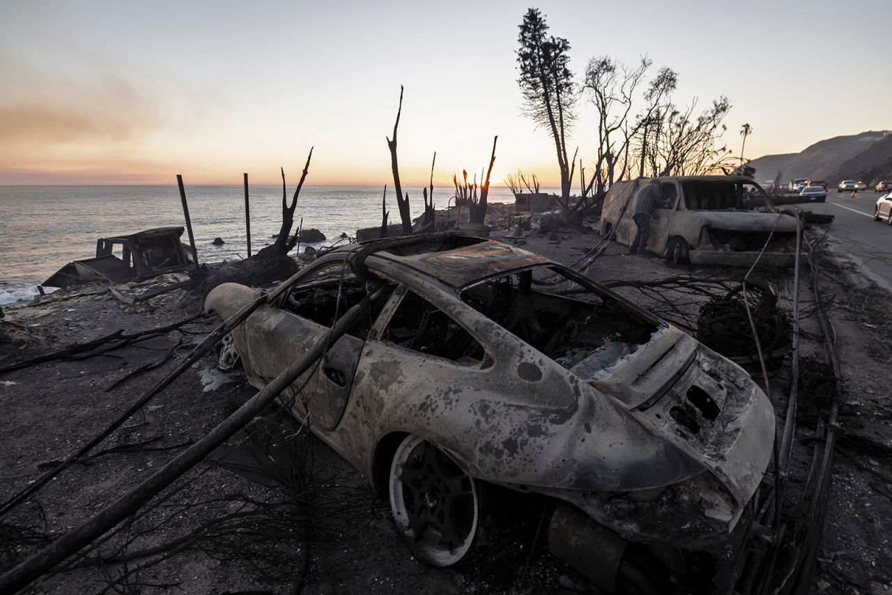 Burned cars seen in the aftermath of a fire on Pacific Coast Highway in Malibu, California, on January 11.