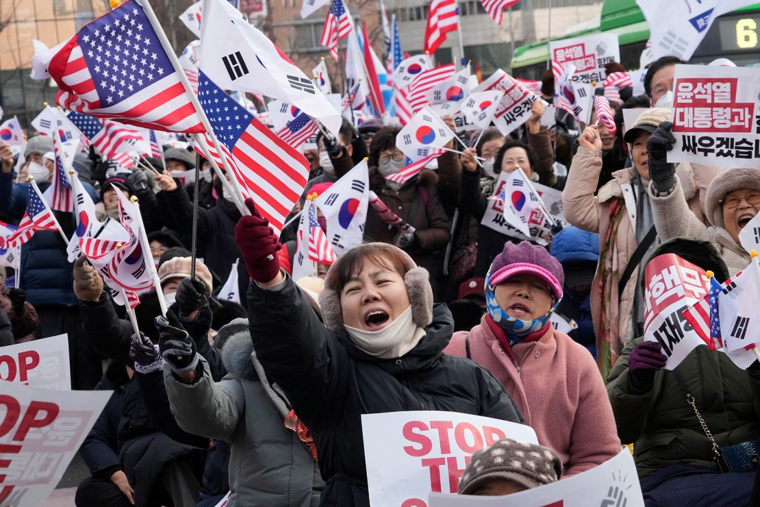 Supporters of impeached South Korean President Yoon Seok-yeol shout slogans during a rally against impeachment near the presidential palace in Seoul, South Korea, on January 12, 2025.