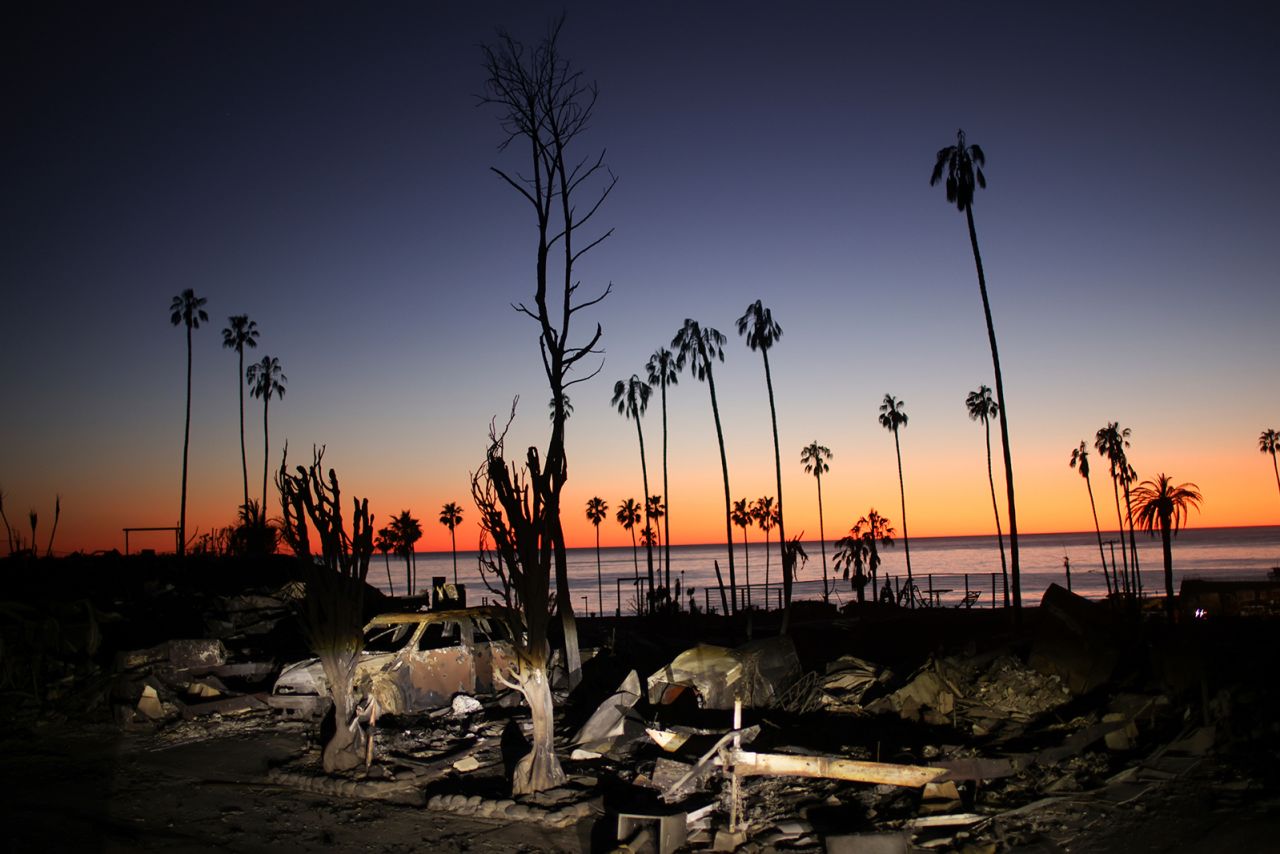 The devastation of the Palisades Fire is seen at sunset in the Pacific Palisades neighborhood of Los Angeles, on Tuesday.