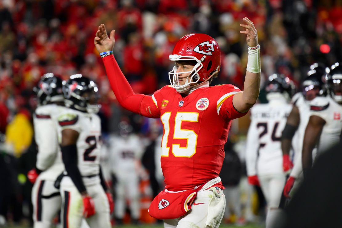 Kansas City Chiefs quarterback Patrick Mahomes encourages the crowd to make noise as they run down the clock in their game against the Houston Texans.