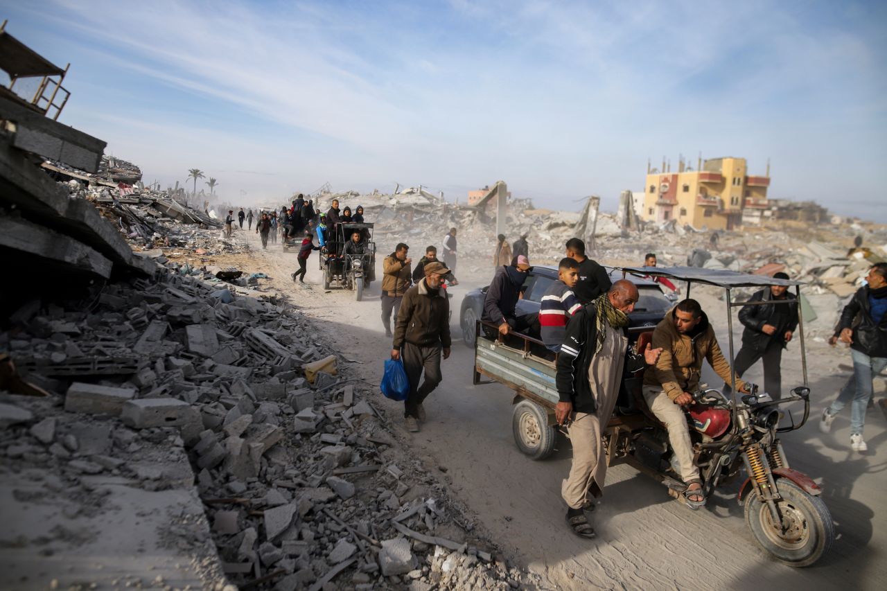 Displaced Palestinians leave parts of Khan Younis as they return to their homes in Rafah, Gaza on Sunday.