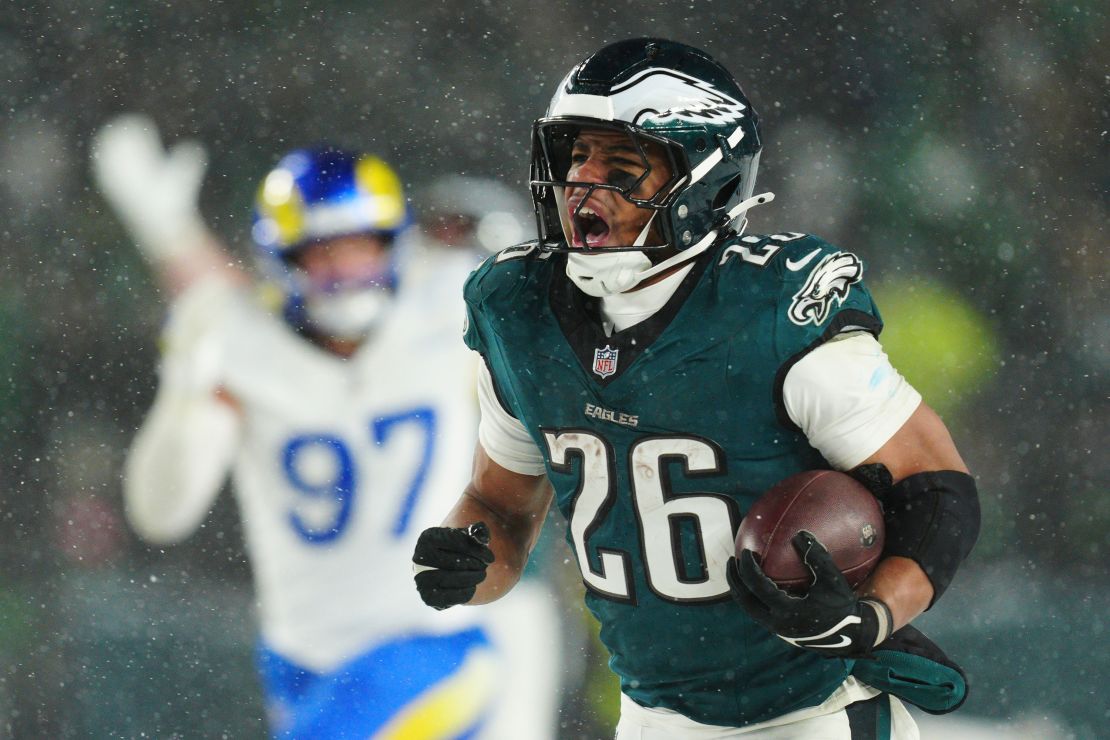 Philadelphia Eagles running back Saquon Barkley (26) runs the ball for a touchdown during the second half.