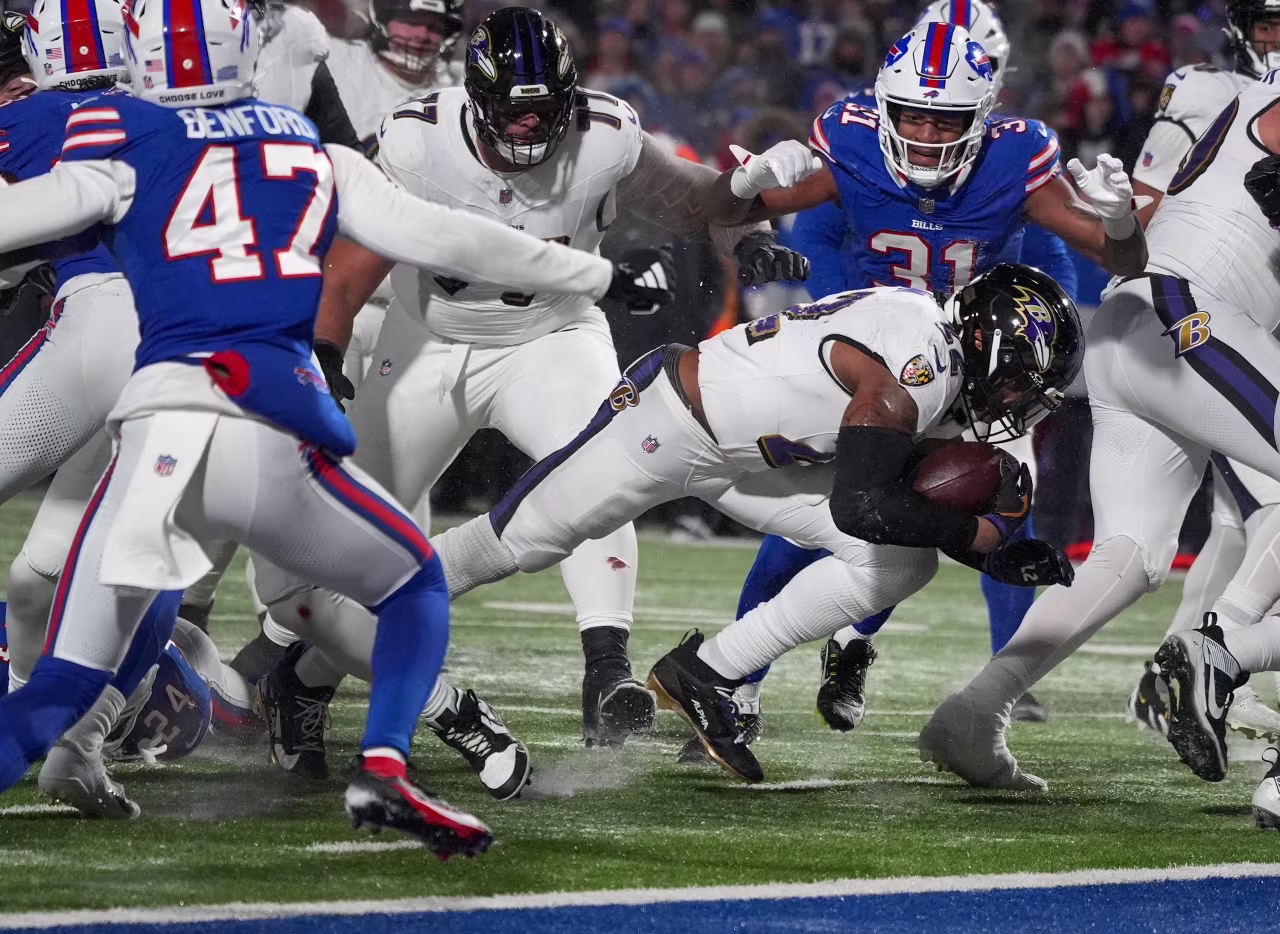 Baltimore Ravens running back Derrick Henry crosses the goal line for a touchdown in the third quarter.