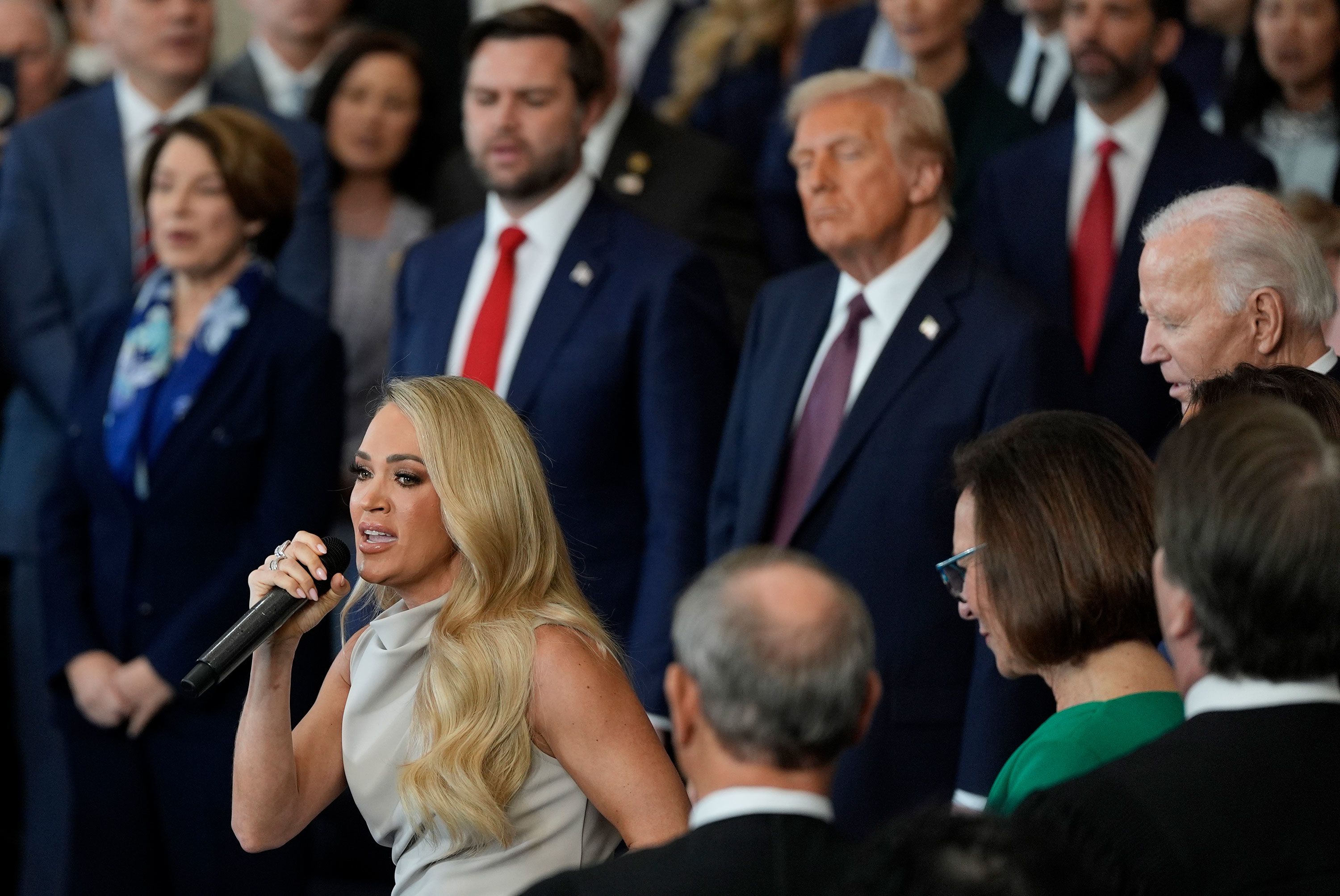 Carrie Underwood performs "America the Beautiful" during the inauguration ceremony.