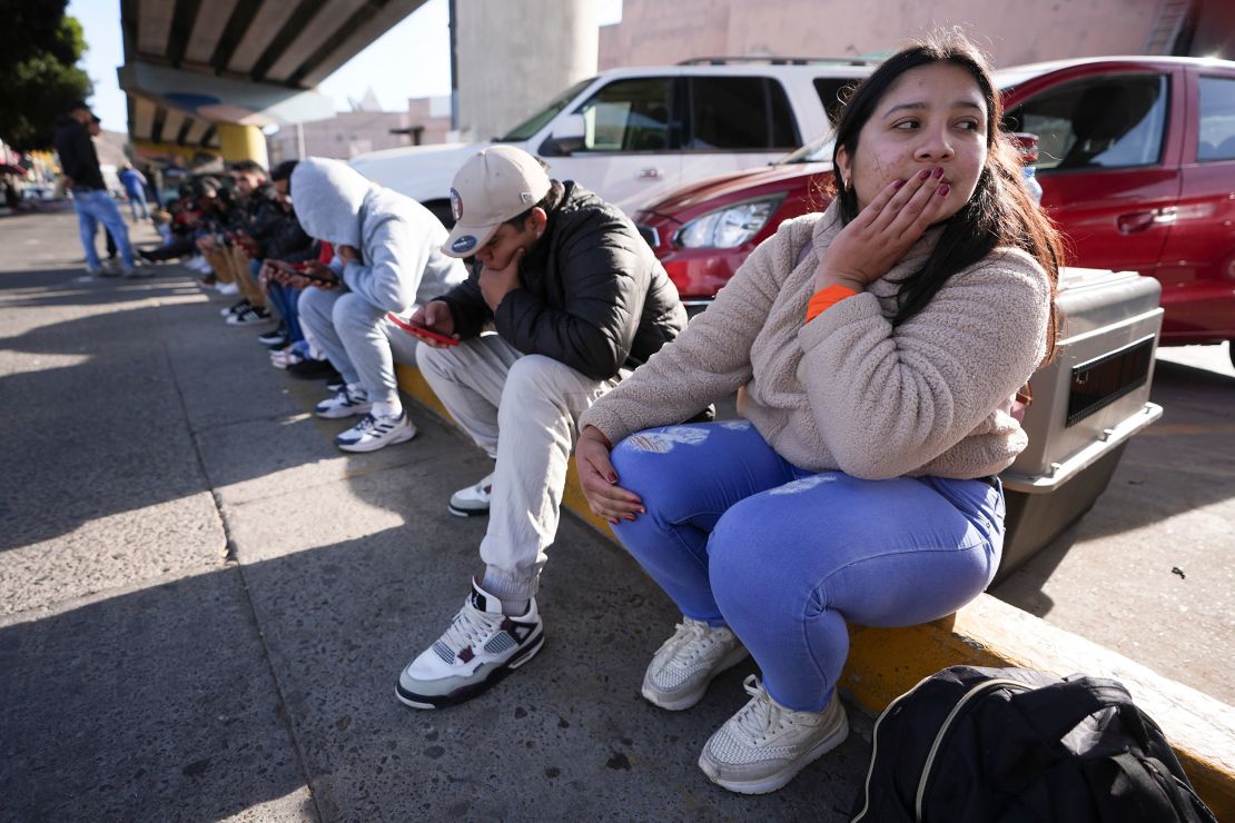 Melanie Mendoza of Venezuela gets emotional after seeing that her 1 p.m. appointment with U.S. Customs and Border Protection was canceled on Monday, January 20. 2025 -- the day Trump took office. She and her family were waiting at the border crossing in Tijuana, Mexico.