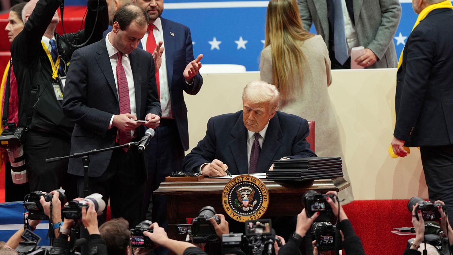 President Trump signs an executive order in Washington on January 20, 2025.