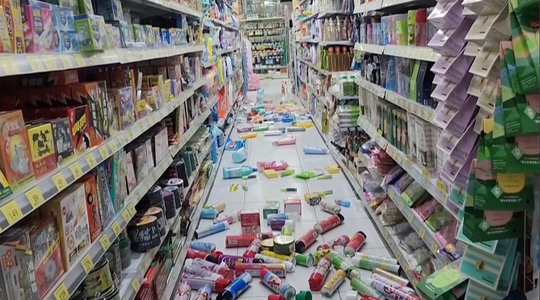 Bottles and cans are scattered on the floor at a convenience store in Tainan.