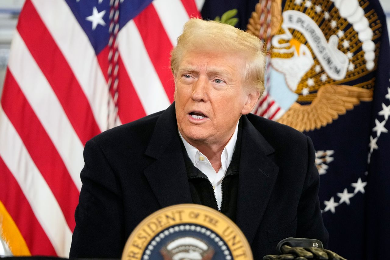 President Donald Trump is briefed on the effects of Hurricane Helene at Asheville Regional Airport in Fletcher, North Carolina, on Friday.