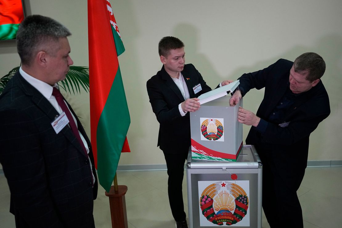 Members of an election commission prepare ballot boxes at a polling site in Minsk, Belarus, on Sunday.