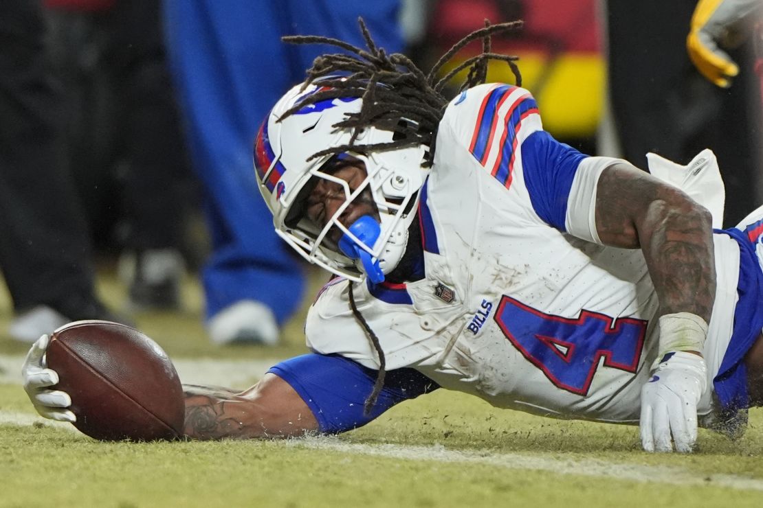 Buffalo Bills running back James Cook (4) scores on a 1-yard run during the second ‌half of the AFC Championship.