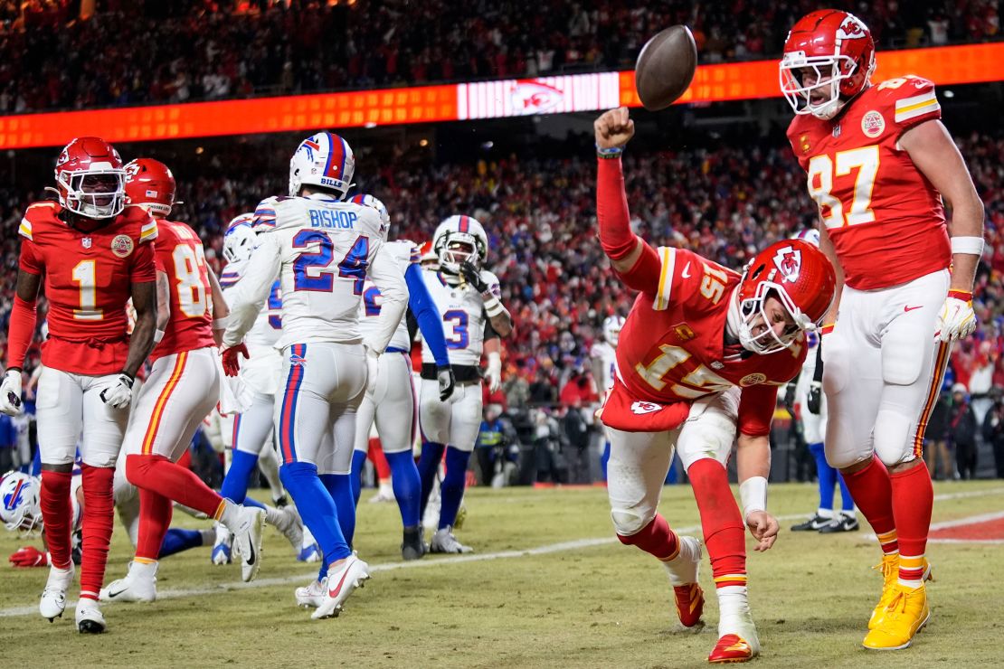 Kansas City Chiefs quarterback Patrick Mahomes (No. ‌15) celebrates his touchdown with teammate ​Travis Kelce (87) during the second half of the AFC championship.